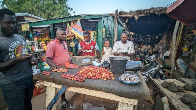 Fresh red kola nuts (pre-dried) and bitter kola (front right, in plastic) at Bolgatanga Market